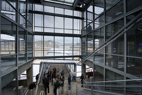 Participants at the NREL Parking Garage Workshop tour NREL's new energy-efficient parking structure,: which is expected to perform 90% better than a standard garage built just to code.  Photograph courtesy of NREL by Dennis Schroeder